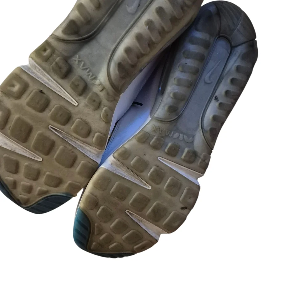 Nike Silver and‎ Black Athletic Shoes Sleek Design